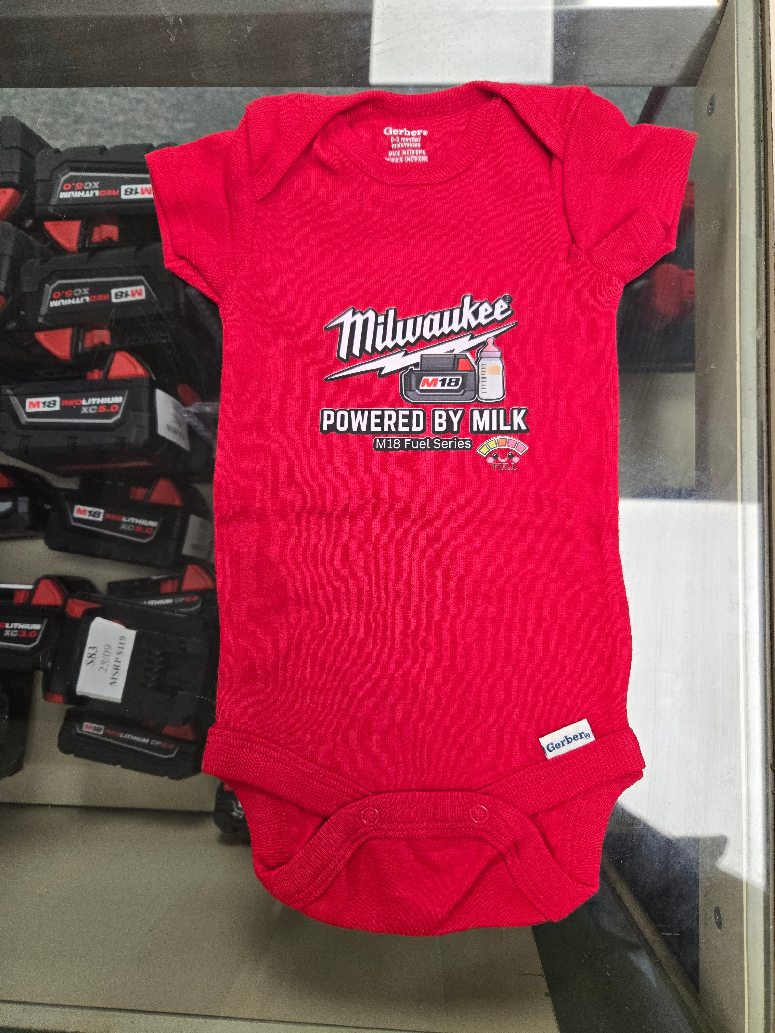 POWERED BY MILK BABY ONESIE